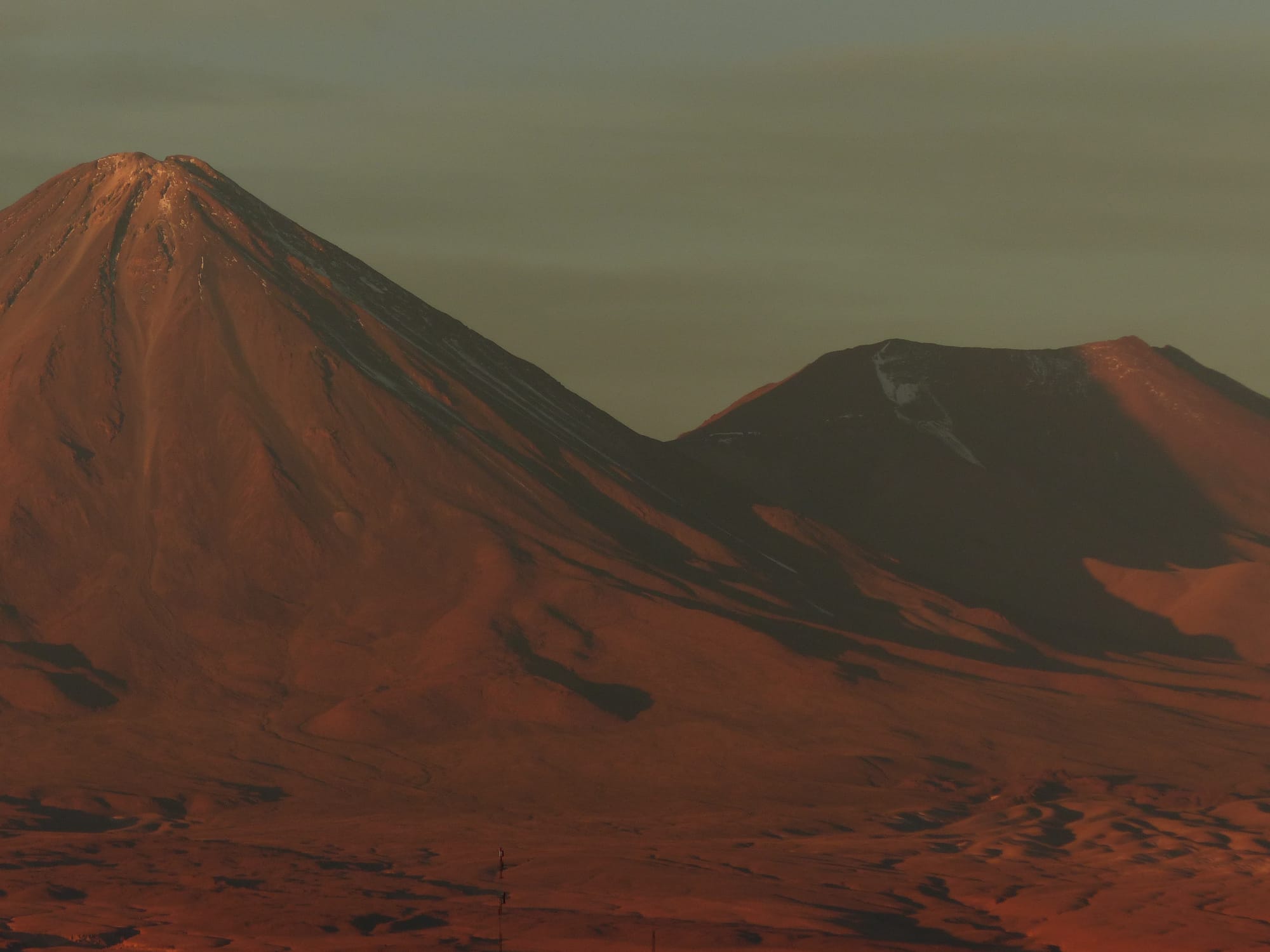 Volcanoes and mountains in San Pedro de Atacama, Chile during sunset.